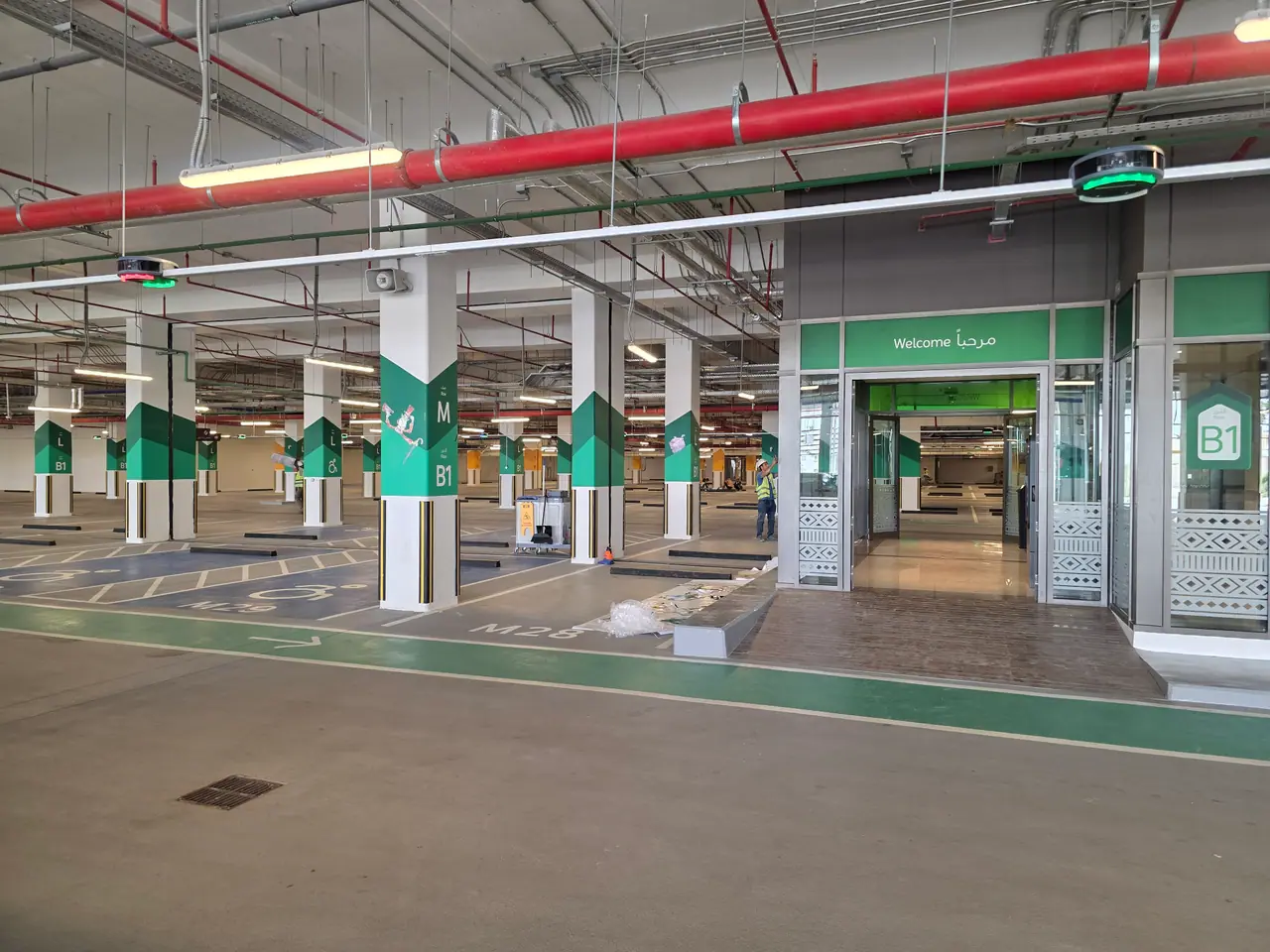 Seven Abha — Destination Graphics & Wayfinding — Car-park lobby entrance and column graphics